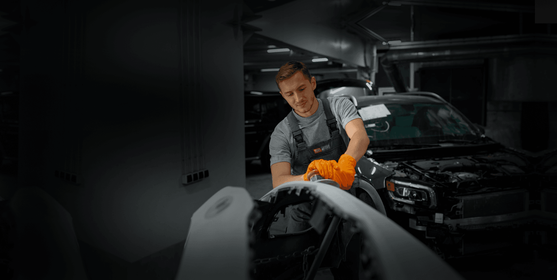 Tony Motors technician working on a vehicle